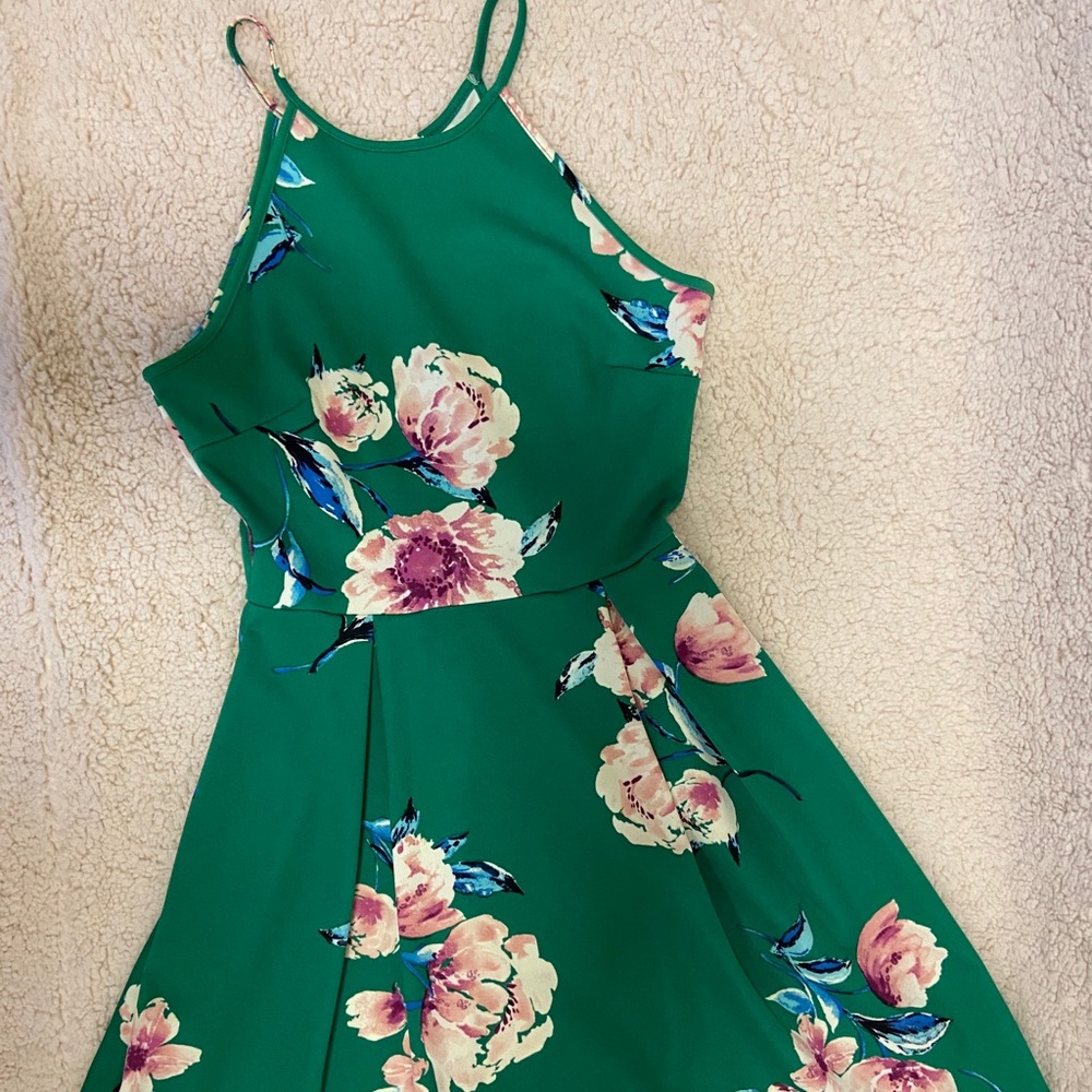 Green Soprano woman’s dress.